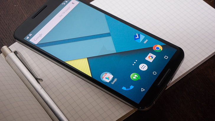 Schwarzes Android-Smartphone auf weißem Papier, Google Nexus 6, Motorola Nexus 6, Beste Smartphones 2015, Smartphone-Test, Nexus-Familie, Notebook, HD-Hintergrundbild