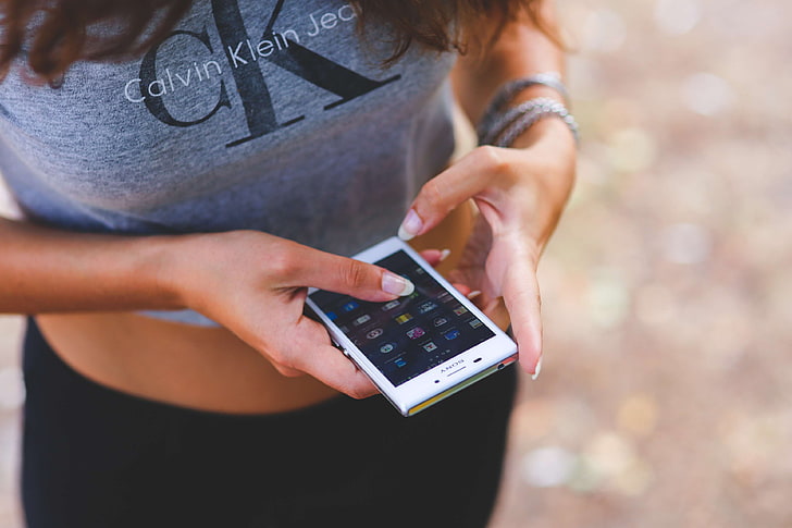 calvin klein, cell phone, girl, hands, mobile, mockup, phone, smartphone, sony, technology, touchscreen, woman, HD wallpaper