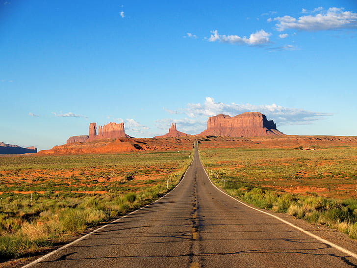 asphalt road in middle of grass field under blue sky, monument Valley, monument Valley Tribal Park, uSA, utah, desert, arizona, butte - Rocky Outcrop, mesa, navajo, southwest USA, wild West, mesa - Arizona, landscape, nature, north American Tribal Culture, scenics, outdoors, travel, sandstone, no People, colorado Plateau, west - Direction, famous Place, rock - Object, national Park, public Land, road, HD wallpaper