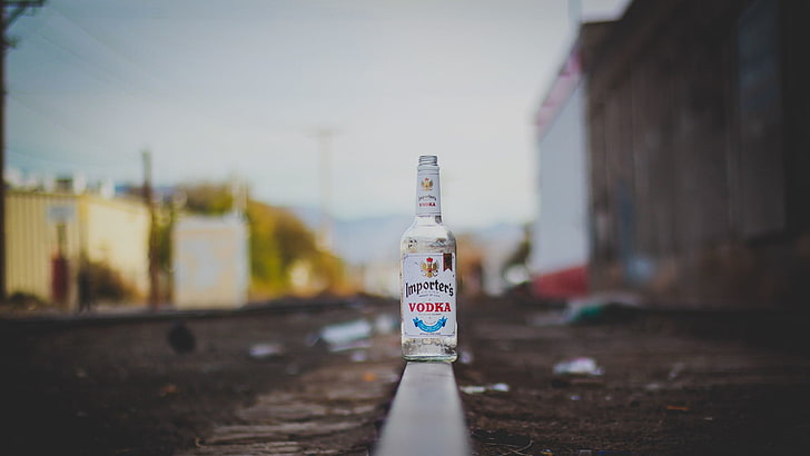 white and black labeled bottle, railway, bottles, vodka, HD wallpaper