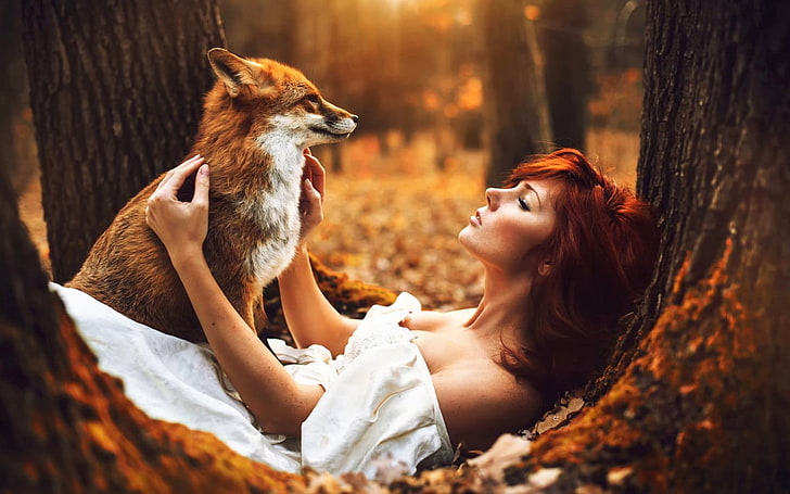 brown and white fox, woman lying on tree trunk with red fox, women, model, redhead, long hair, bare shoulders, fox, nature, animals, trees, white dress, open mouth, fall, leaves, depth of field, moss, women outdoors, forest, dress, HD wallpaper