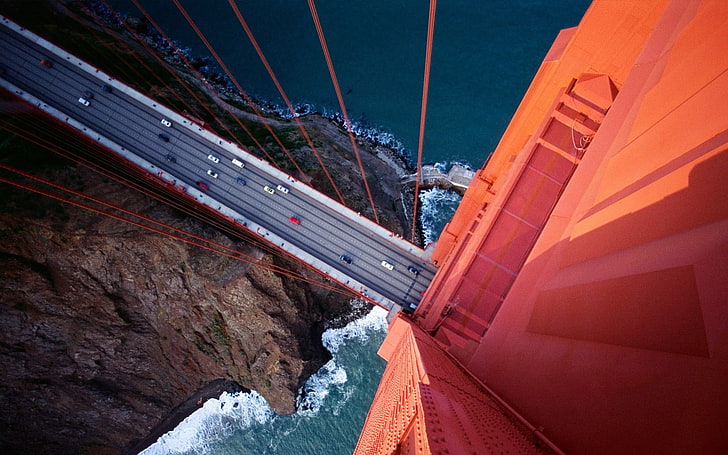 high angle photo of suspension bridge, Golden Gate Bridge, bird's eye view, aerial view, rock, bridge, San Francisco, road, photography, water, car, HD wallpaper