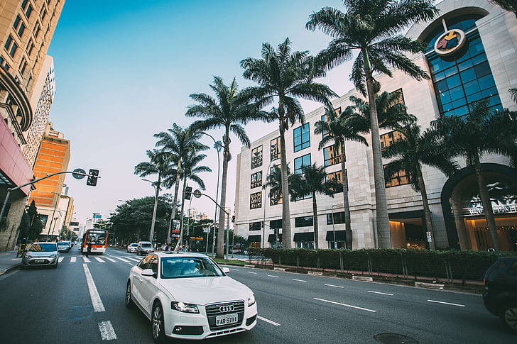 architecture, audi, automobile, avenue, blur, buildings, cars, city, daylight, hotel, modern, outdoors, palm trees, pavement, road, street, tourism, town, traffic, transportation system, urban, vehicles, HD wallpaper