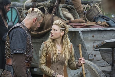 blonde haired woman holding brown wooden stick facing man in black and brown clothes, Björn Ironside, Alexander Ludwig, Lagertha, Katheryn Winnick, Vikings, HD wallpaper HD wallpaper