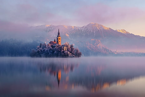 white snow-capped mountain, brown house near body of water, nature, landscape, architecture, church, trees, mountains, winter, snow, mist, island, lake, water, reflection, sunset, Slovenia, Lake Bled, morning, frost, HD wallpaper HD wallpaper