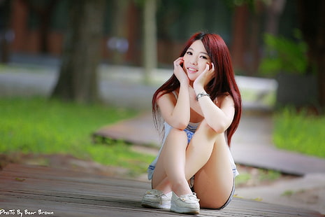 Asian, women, redhead, sitting, smiling, women outdoors, legs crossed, jean shorts, hand on face, HD wallpaper HD wallpaper
