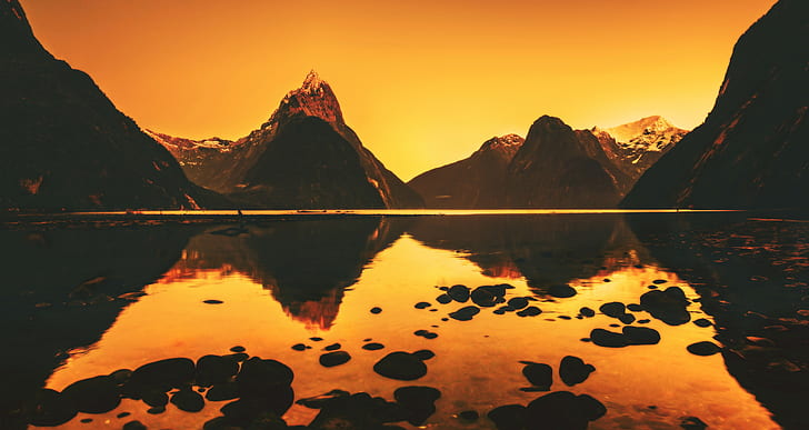 photography, mountains, lake, sunset, orange, nature, landscape, reflection, stones, pebbles, water, calm, Milford Sound, HD wallpaper
