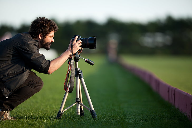 black DSLR camera and tripod, greens, grass, mustache, nature, background, situation, Wallpaper, frame, meadow, the camera, male, beard, guy, curls, brunette, HD wallpaper